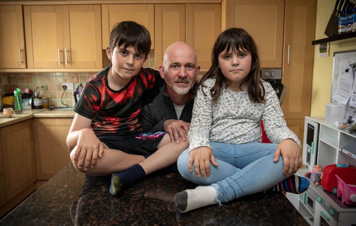 Another hurdle Michael (centre) faced was having to go to court to apply for a guardianship order for his children, which cost his family several hundred euros. Photo: Dominic Walsh © Eye Focus LTD